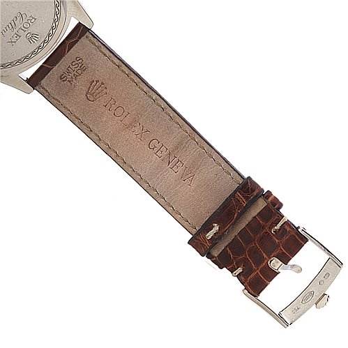 The image shows the back view of a Rolex Cellini 4233 Men's White Gold Black Dial 4233 Men's White Gold Black Dial watch strap and clasp, highlighting the embossed branding and stitching details.