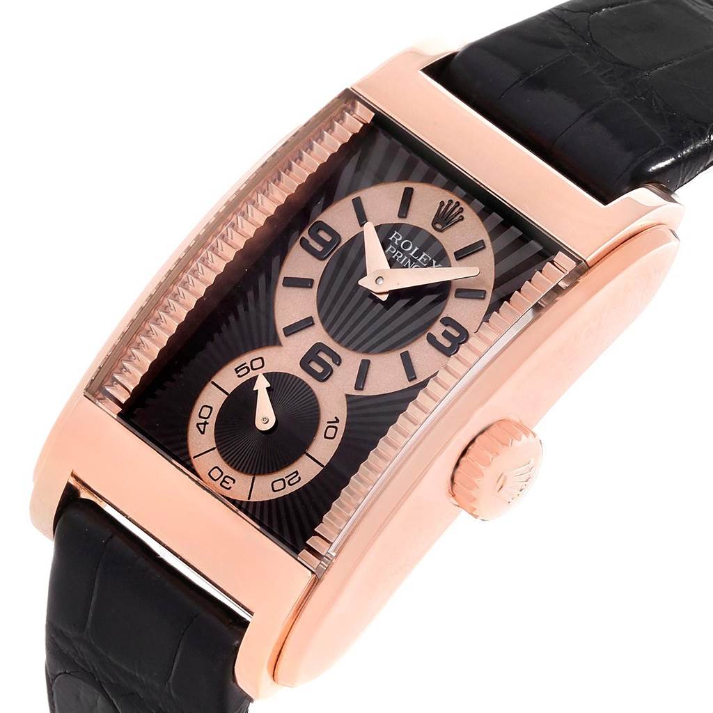 This image shows the Rolex Cellini 5442/5 Men's Rose Gold Black Dial 5442/5 Men's Rose Gold Black Dial watch at a slight angle highlighting its rectangular dial, gold case, crown, and black strap.