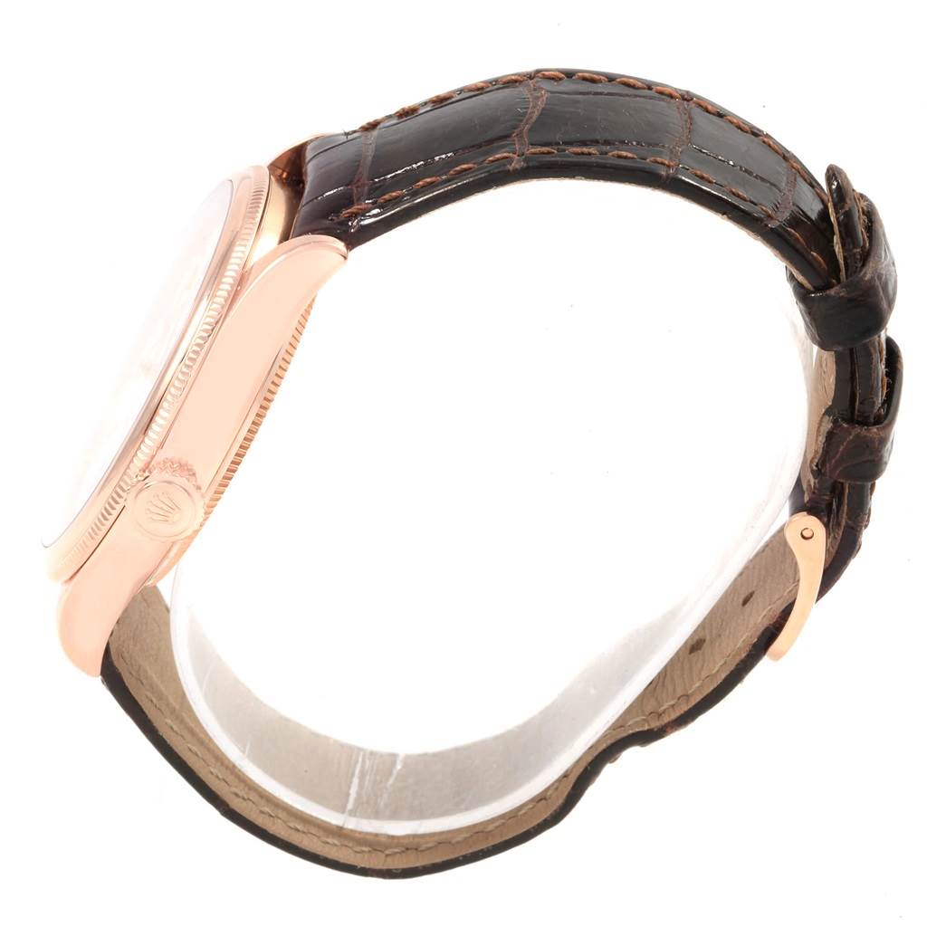 The image shows a side view of the Rolex Cellini 50505 Men's Rose Gold White Dial 50505 Men's Rose Gold White Dial watch, focusing on the case, crown, and leather strap.