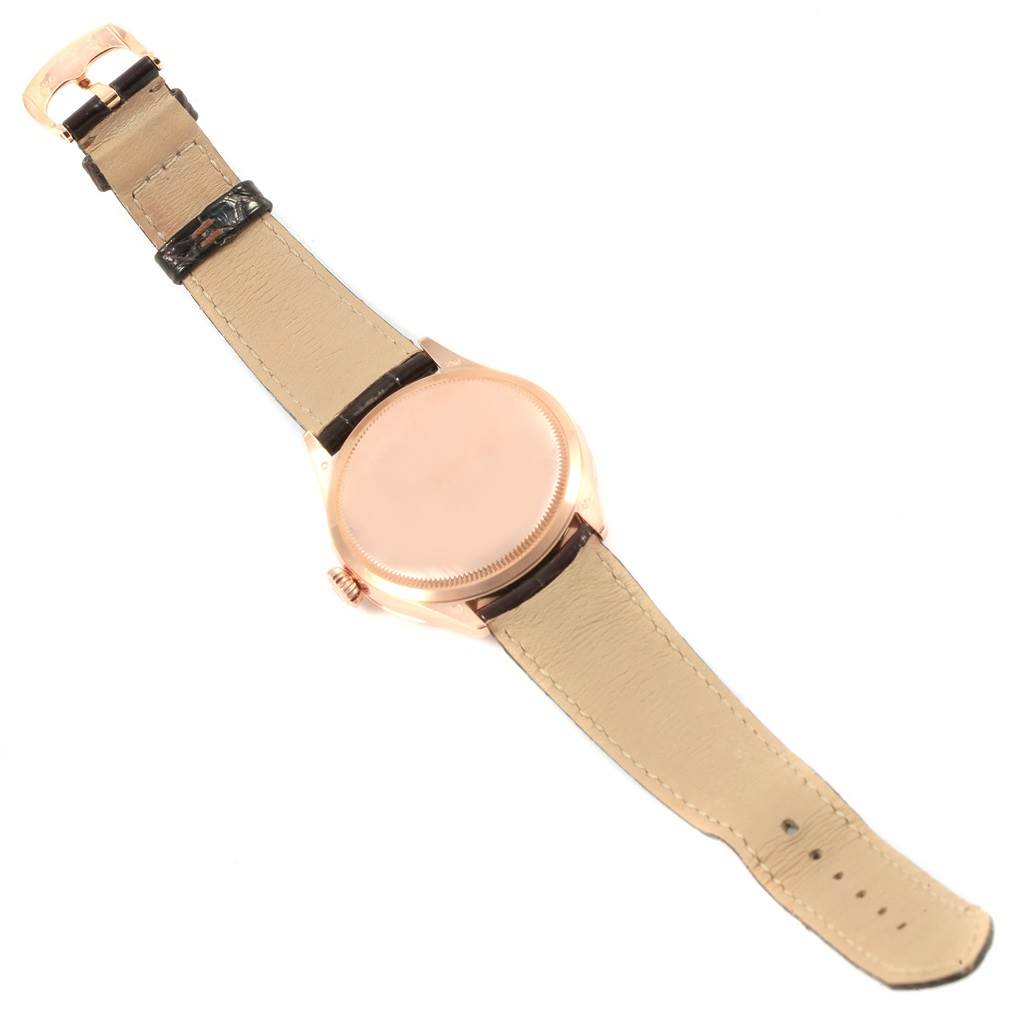 The image shows the back and strap of a Rolex Cellini 50505 Men's Rose Gold White Dial 50505 Men's Rose Gold White Dial watch, viewed from above.