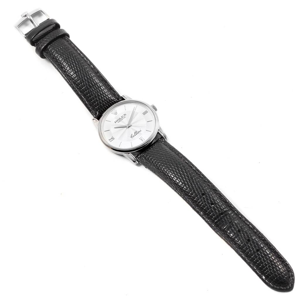 The image shows a top-down view of a Rolex Cellini 5116 Men's White Gold Silver Dial 5116 Men's White Gold Silver Dial watch with a black leather strap.