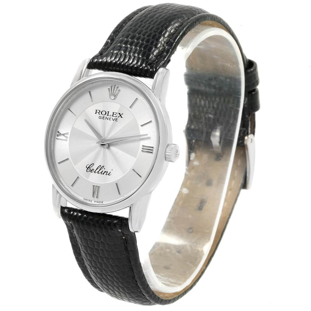 The image shows a Rolex Cellini 5116 Men's White Gold Silver Dial 5116 Men's White Gold Silver Dial watch from an angled front view, highlighting the dial, case, and black leather strap.