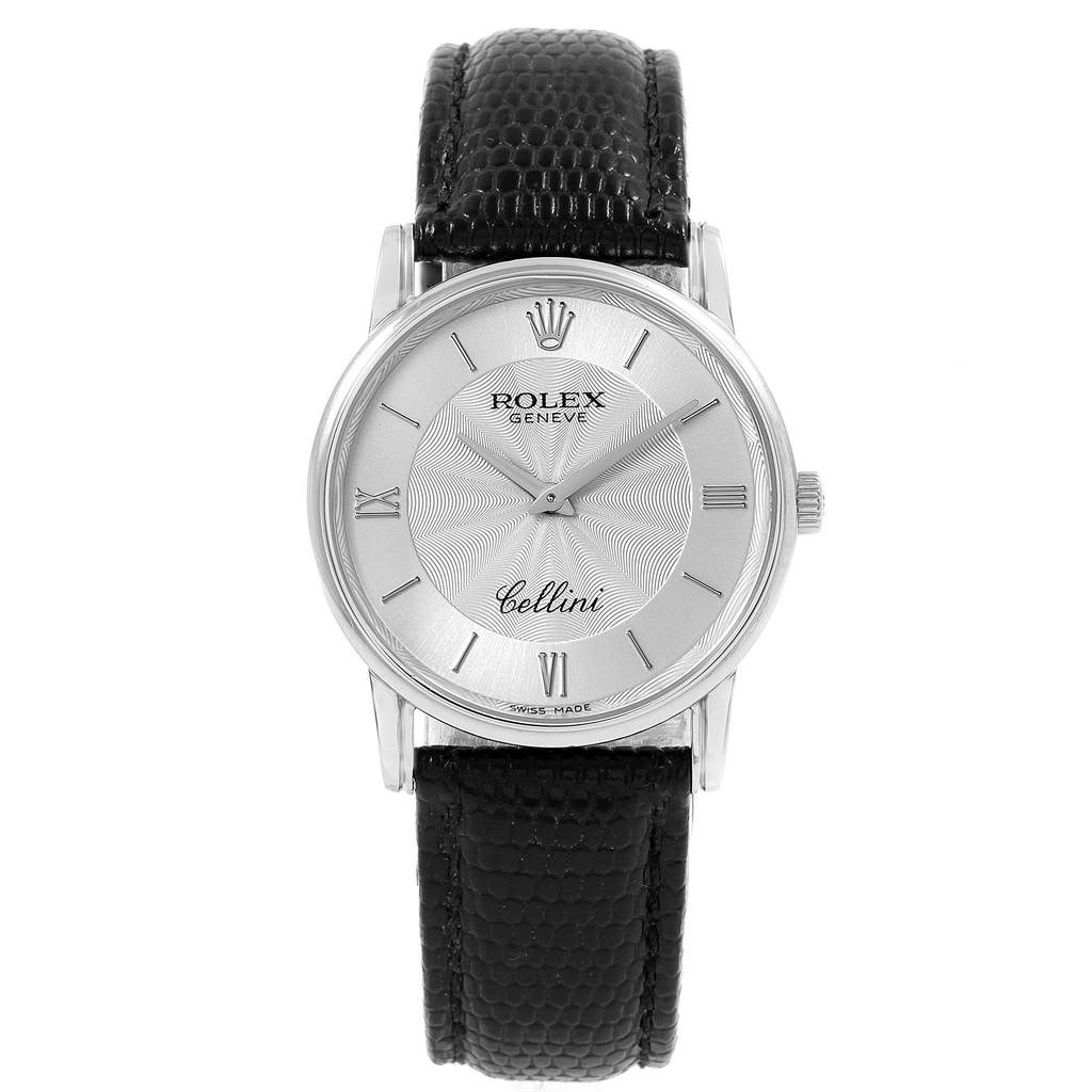 The Rolex Cellini 5116 Men's White Gold Silver Dial 5116 Men's White Gold Silver Dial watch is displayed frontally, showing its face, black leather strap, Roman numerals, and silver dial.