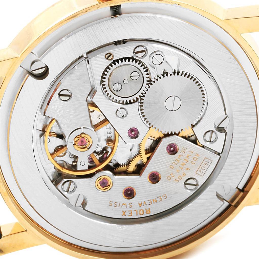 This image shows the movement and inner mechanics of a Rolex Cellini 5115 Men's Yellow Gold Beige Dial 5115 Men's Yellow Gold Beige Dial watch viewed from the back.