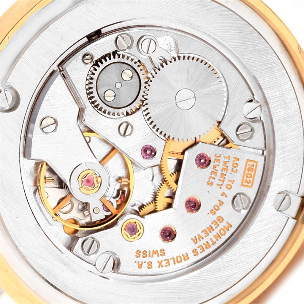 This image shows the exposed movement mechanism of a Rolex Cellini 5115 Yellow Gold Mother of Pearl Dial 5115 Yellow Gold Mother of Pearl Dial watch from a close-up, top-down angle.