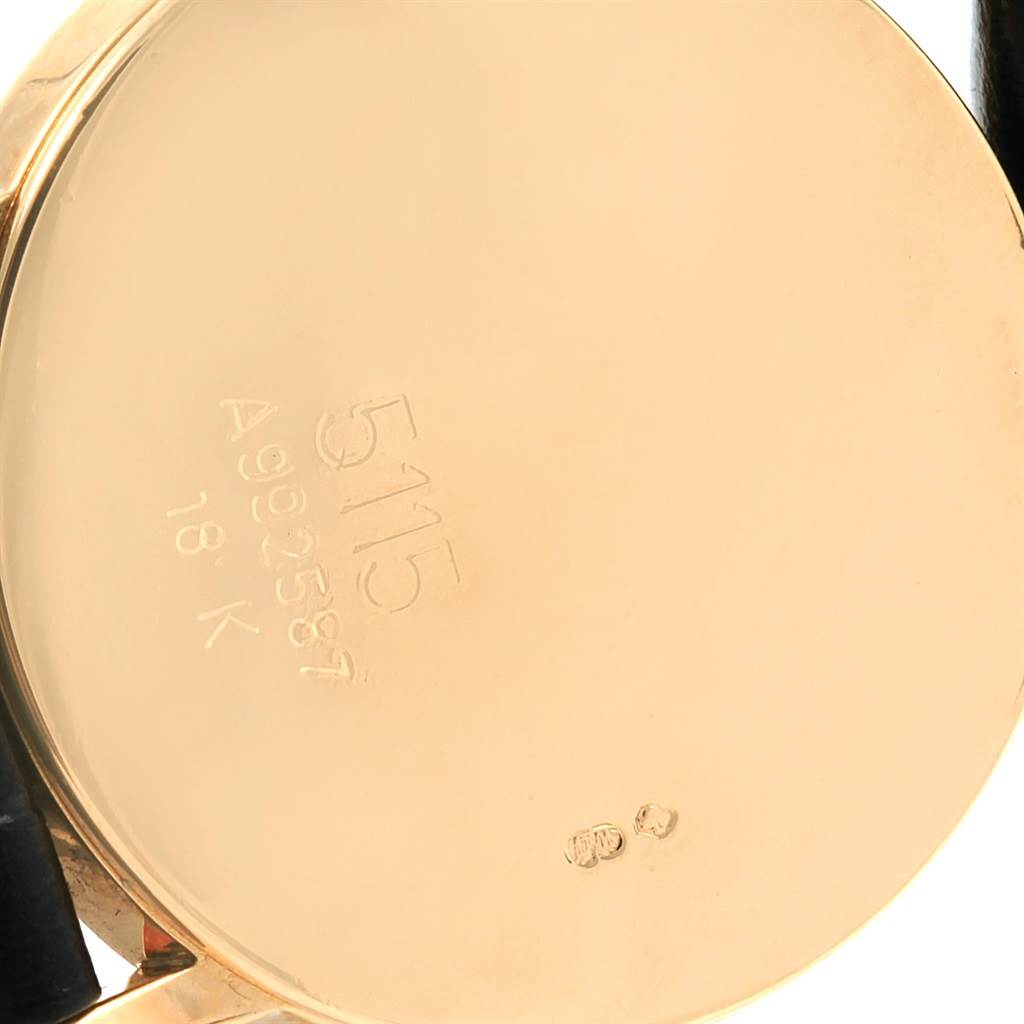 The image shows the back case of a Rolex Cellini 5115 Yellow Gold Mother of Pearl Dial 5115 Yellow Gold Mother of Pearl Dial watch, highlighting the engraved serial number and material (18K gold).