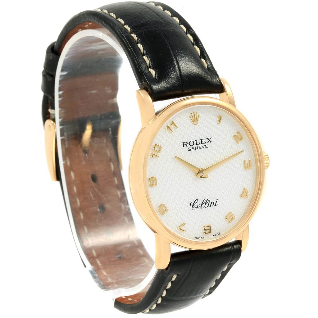 The image shows a side angle of a Rolex Cellini 5115 Yellow Gold Mother of Pearl Dial 5115 Yellow Gold Mother of Pearl Dial watch, displaying its face, crown, and black leather strap.