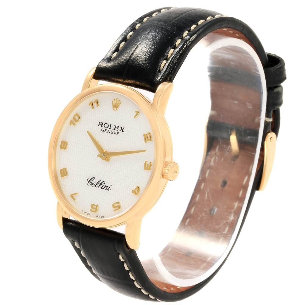 This image shows the Rolex Cellini 5115 Yellow Gold Mother of Pearl Dial 5115 Yellow Gold Mother of Pearl Dial watch from an angled side view, displaying the face, strap, and crown.