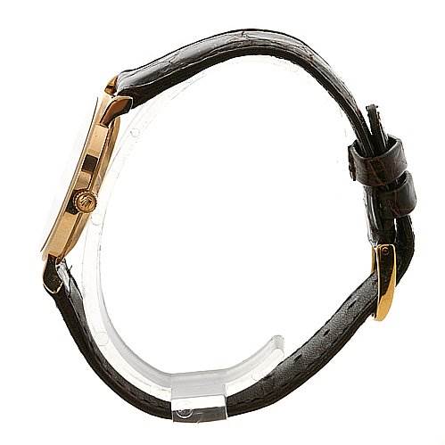 The image shows a side view of the Rolex Cellini 5112 Yellow Gold Beige Dial 5112 Yellow Gold Beige Dial watch, highlighting its gold case, crown, leather strap, and buckle.