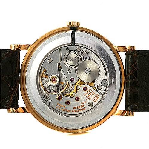 This image shows the movement and inner workings of a Rolex Cellini 5112 Yellow Gold Beige Dial 5112 Yellow Gold Beige Dial model from the back.