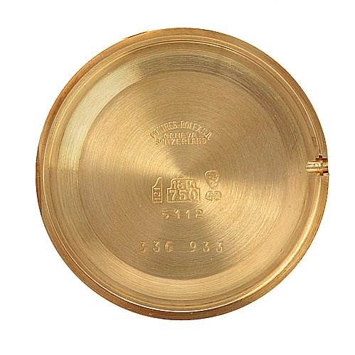 The image shows the interior case back of a Rolex Cellini 5112 Yellow Gold Beige Dial 5112 Yellow Gold Beige Dial watch with engraved markings.