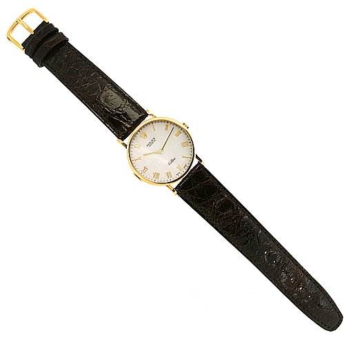 This image shows a top-down view of a Rolex Cellini 5112 Yellow Gold Beige Dial 5112 Yellow Gold Beige Dial watch, highlighting the face, strap, and buckle.