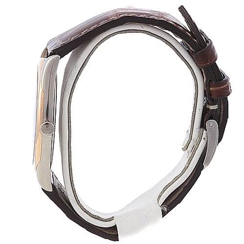 This image shows a side view of the Rolex Cellini 4233 Men's White Gold Black Dial 4233 Men's White Gold Black Dial watch, featuring its case, crown, and leather strap with a buckle.