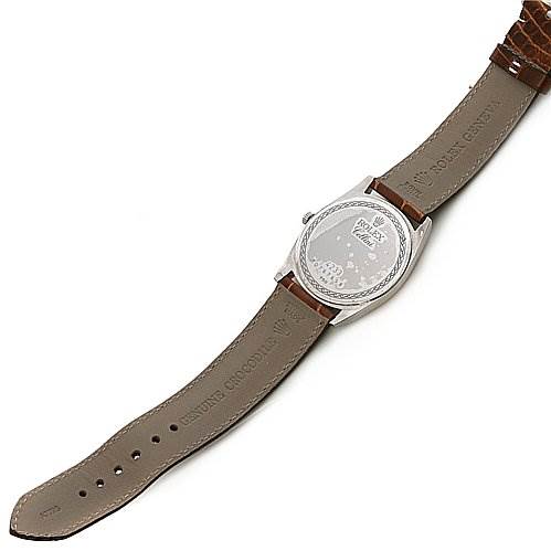 This image shows the back side of a Rolex Cellini 4233 Men's White Gold Black Dial 4233 Men's White Gold Black Dial watch, displaying the leather strap and the case back.