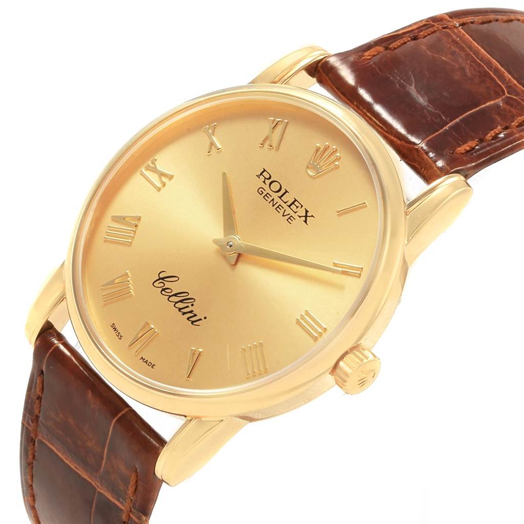 The image shows a Rolex Cellini 5116 Men's Yellow Gold Champagne Dial 5116 Men's Yellow Gold Champagne Dial watch at a slight angle, displaying its gold face, Roman numerals, and brown leather strap.