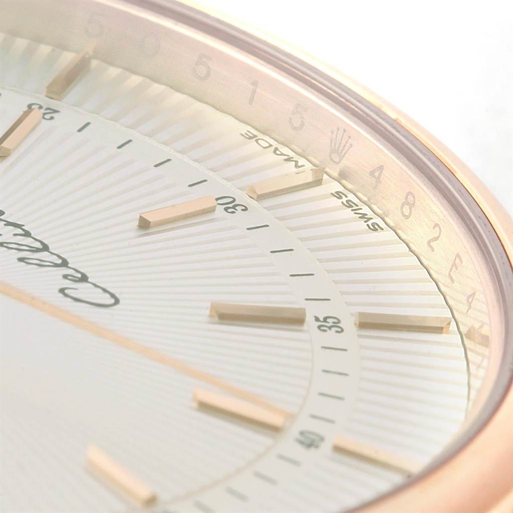 Close-up angle of the Rolex Cellini 50515 Men's Rose Gold Silver Dial 50515 Men's Rose Gold Silver Dial watch showing part of the dial, minute markers, and bezel.