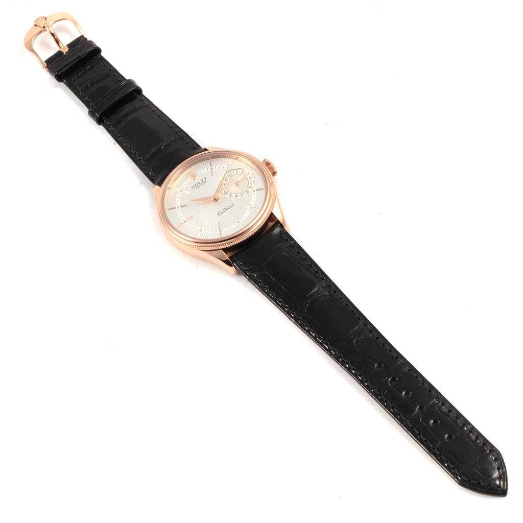 The image shows a Rolex Cellini 50515 Men's Rose Gold Silver Dial 50515 Men's Rose Gold Silver Dial watch at an angled top view, featuring its face, strap, and buckle.