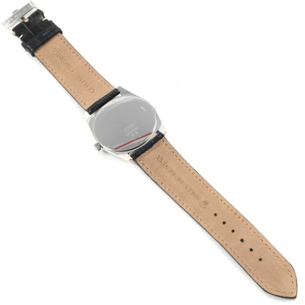 The image shows the rear view of a Rolex Cellini 4233 Men
s White Gold White Dial 4233 Men
s White Gold White Dial watch, focusing on the back of the case and the leather strap.