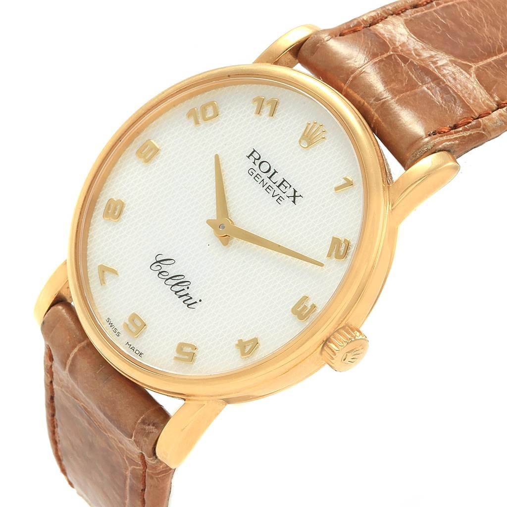 The Rolex Cellini 5115 Yellow Gold Mother of Pearl Dial 5115 Yellow Gold Mother of Pearl Dial watch is shown from a front angle, highlighting its dial, crown, and brown leather strap.
