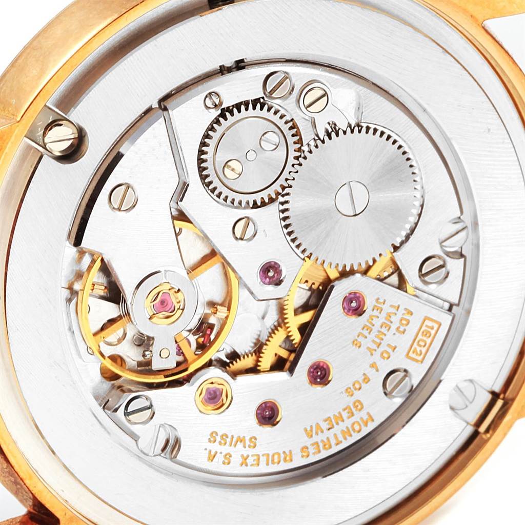 This is an up-close view of the internal movement and gears of a Rolex Cellini 5115 Yellow Gold Mother of Pearl Dial 5115 Yellow Gold Mother of Pearl Dial watch.