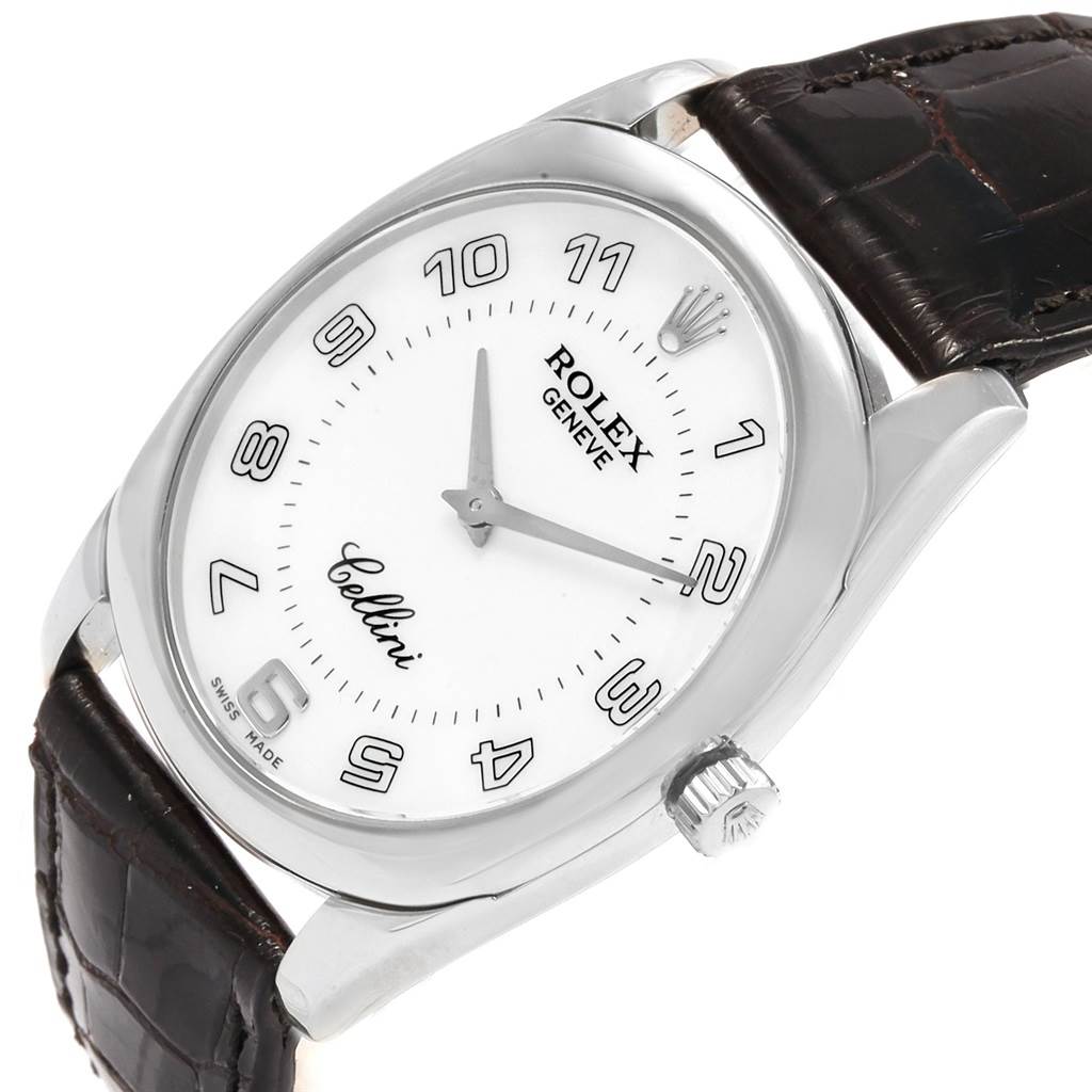 The Rolex Cellini 4233 Men's White Gold White Dial 4233 Men's White Gold White Dial watch is shown at a slight angle, highlighting its dial, bezel, crown, and leather strap.