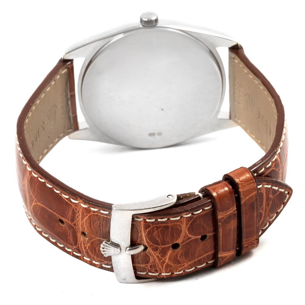 The image shows the back of a Rolex Cellini 4233 Men's White Gold Black Dial 4233 Men's White Gold Black Dial watch with a leather strap and buckle.