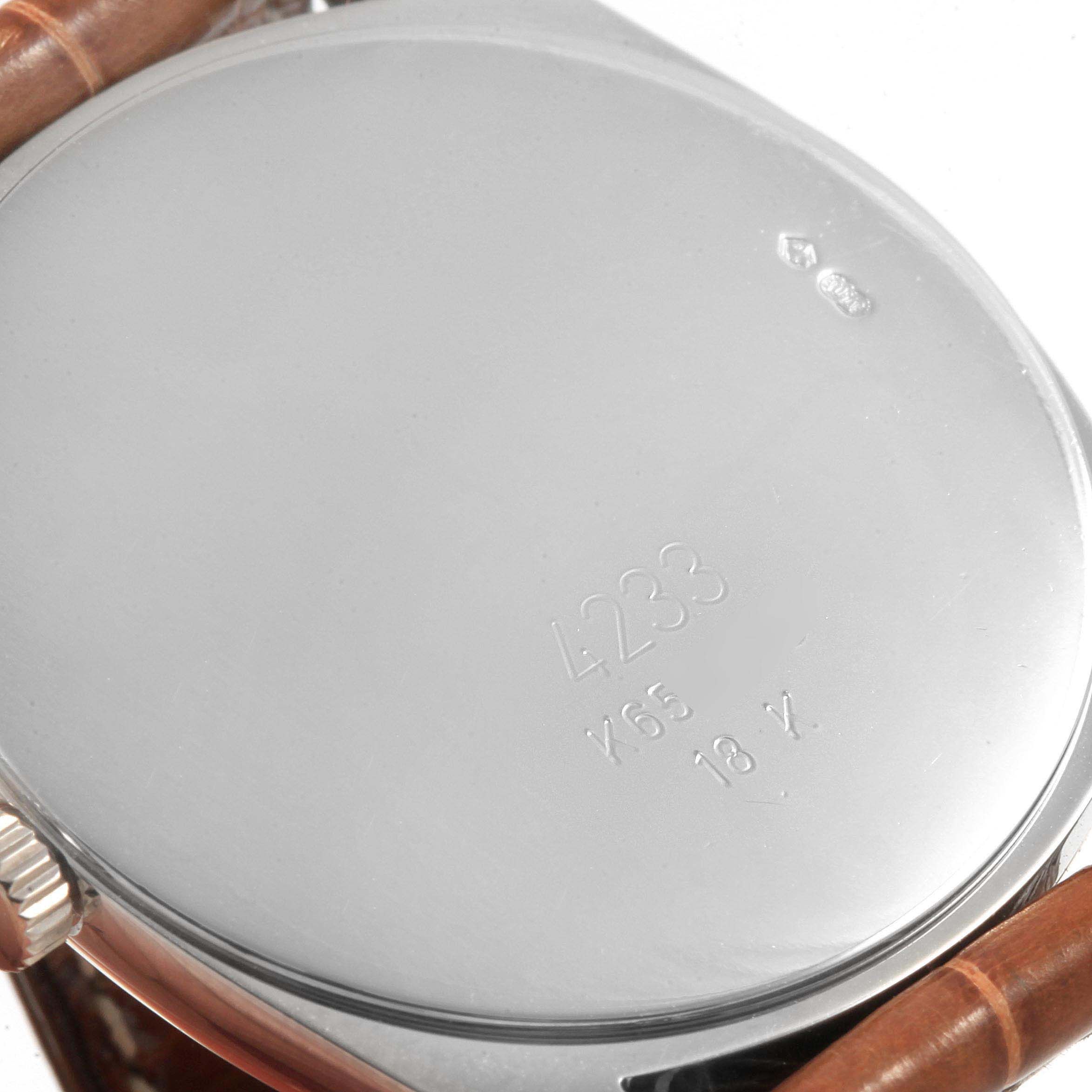 This image shows the back case of a Rolex Cellini 4233 Men's White Gold Black Dial 4233 Men's White Gold Black Dial watch, viewed from a top-down angle.