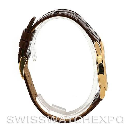 The image shows a side view of a Rolex Cellini 5116 Yellow Gold Silver Dial 5116 Yellow Gold Silver Dial watch, highlighting its brown leather strap and gold-toned case.