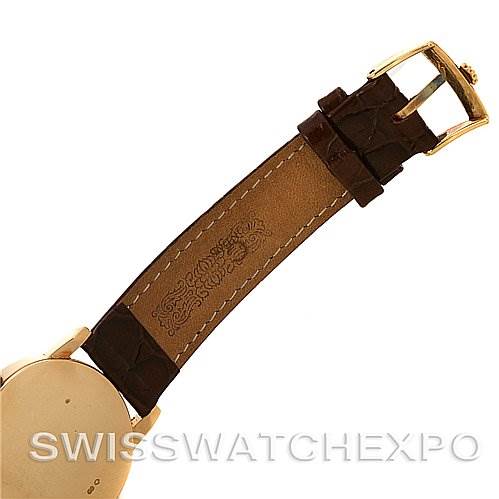 The image shows the back view of a Rolex Cellini 5116 Yellow Gold Silver Dial 5116 Yellow Gold Silver Dial watch, focusing on its leather strap and gold buckle.