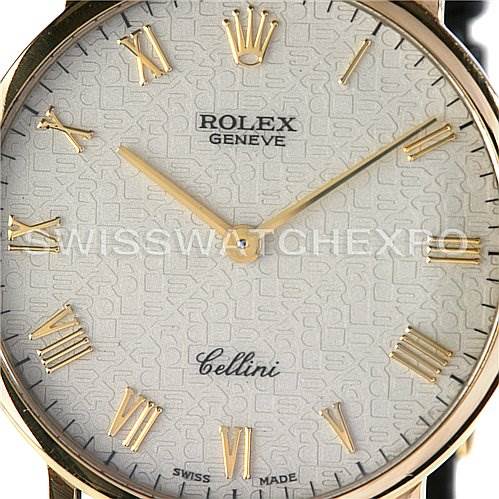 The image shows the face of a Rolex Cellini 5112 Yellow Gold Beige Dial 5112 Yellow Gold Beige Dial watch with Roman numeral hour markers and gold hands.