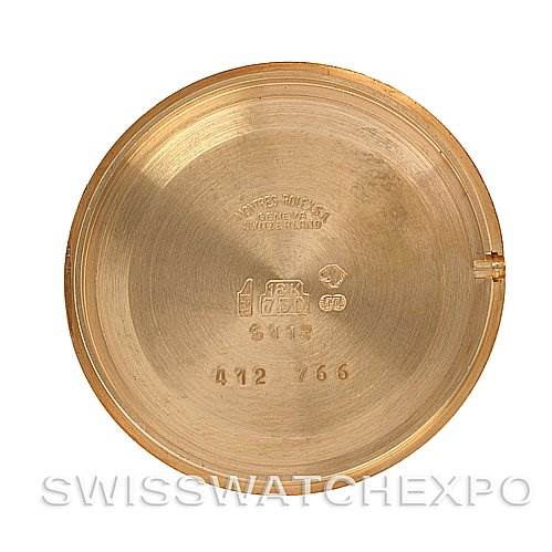 This is an internal view of the case back of a Rolex Cellini 5112 Yellow Gold Beige Dial 5112 Yellow Gold Beige Dial watch, showing the engraved markings and serial number.