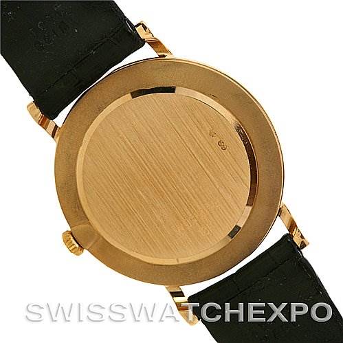 This image shows the back case of a Rolex Cellini 5112 Yellow Gold Beige Dial 5112 Yellow Gold Beige Dial watch, featuring a leather strap.