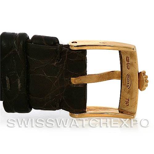 This image shows a close-up of the buckle and part of the strap of a Rolex Cellini 5112 Yellow Gold Beige Dial 5112 Yellow Gold Beige Dial watch.