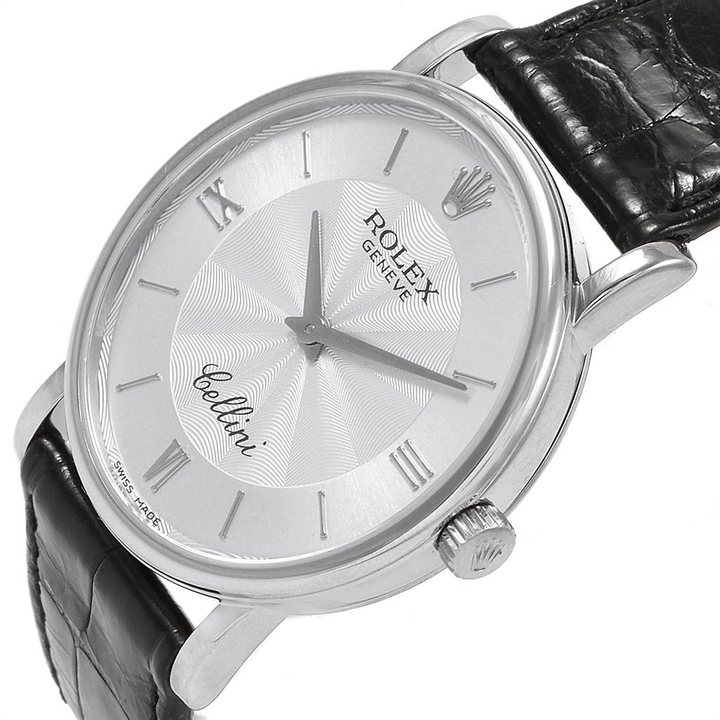 The Rolex Cellini 5115 Men's White Gold Silver Dial 5115 Men's White Gold Silver Dial watch is shown at a slight angle, highlighting the face, crown, and part of the leather strap.