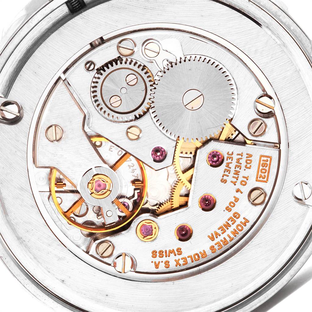 The image shows the movement and internal mechanics of a Rolex Cellini 5116 Men's White Gold Grey Dial 5116 Men's White Gold Grey Dial watch from a close-up, top-down angle.