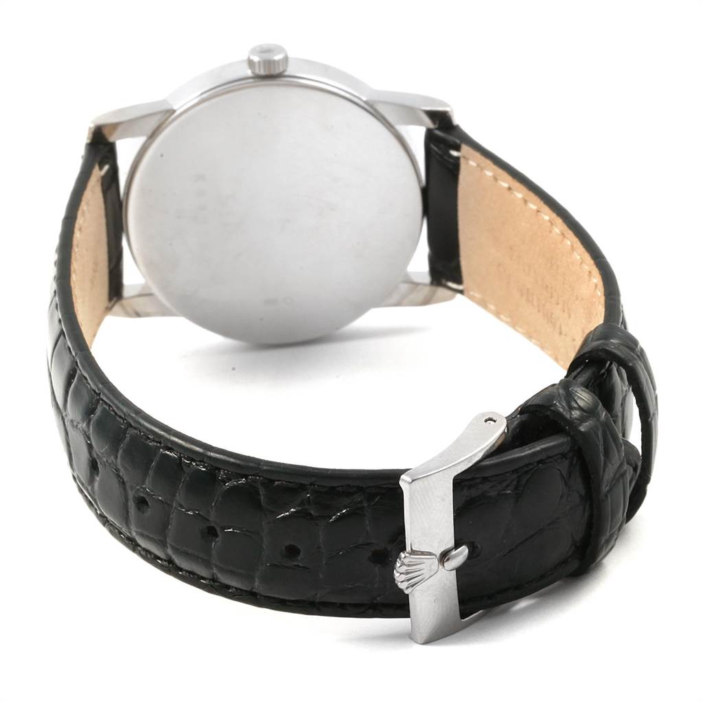 This image shows the back of a Rolex Cellini 5116 Men's White Gold Grey Dial 5116 Men's White Gold Grey Dial watch with its leather strap and clasp.