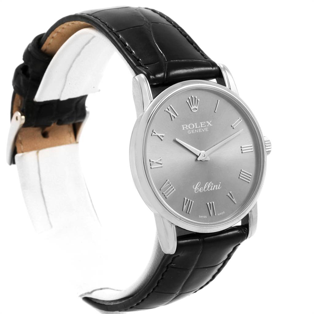 The image shows a side and front view of a Rolex Cellini 5116 Men's White Gold Grey Dial 5116 Men's White Gold Grey Dial watch, highlighting its black leather strap and silver dial.