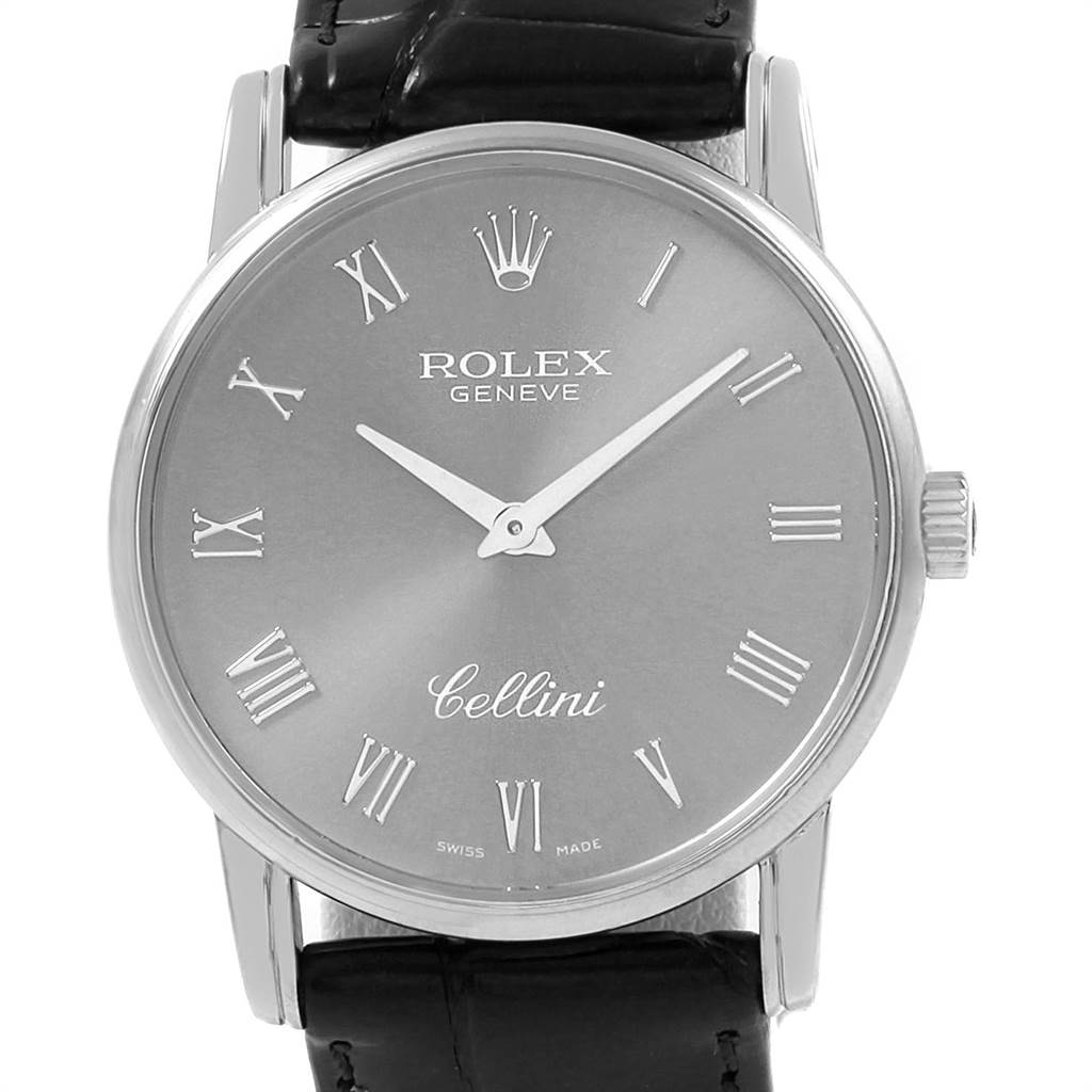 The Rolex Cellini 5116 Men's White Gold Grey Dial 5116 Men's White Gold Grey Dial watch is shown from a front angle, displaying its dial, hands, and strap.