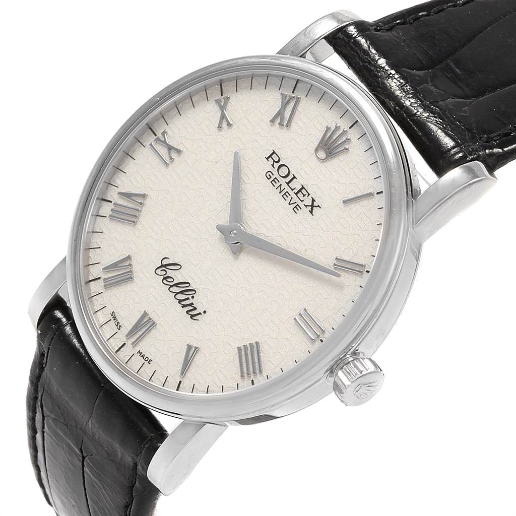 The image shows a close-up of a Rolex Cellini 5115 Men's White Gold Silver Dial 5115 Men's White Gold Silver Dial watch face with a black leather strap, viewed at an angle from the front and right side.