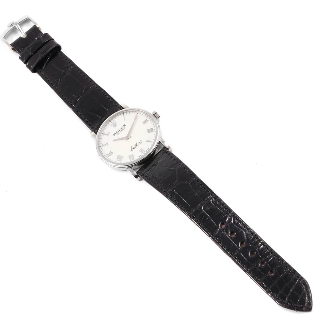 The image shows a full-view angle of a Rolex Cellini 5115 Men's White Gold Silver Dial 5115 Men's White Gold Silver Dial watch with a black leather strap and a silver dial.