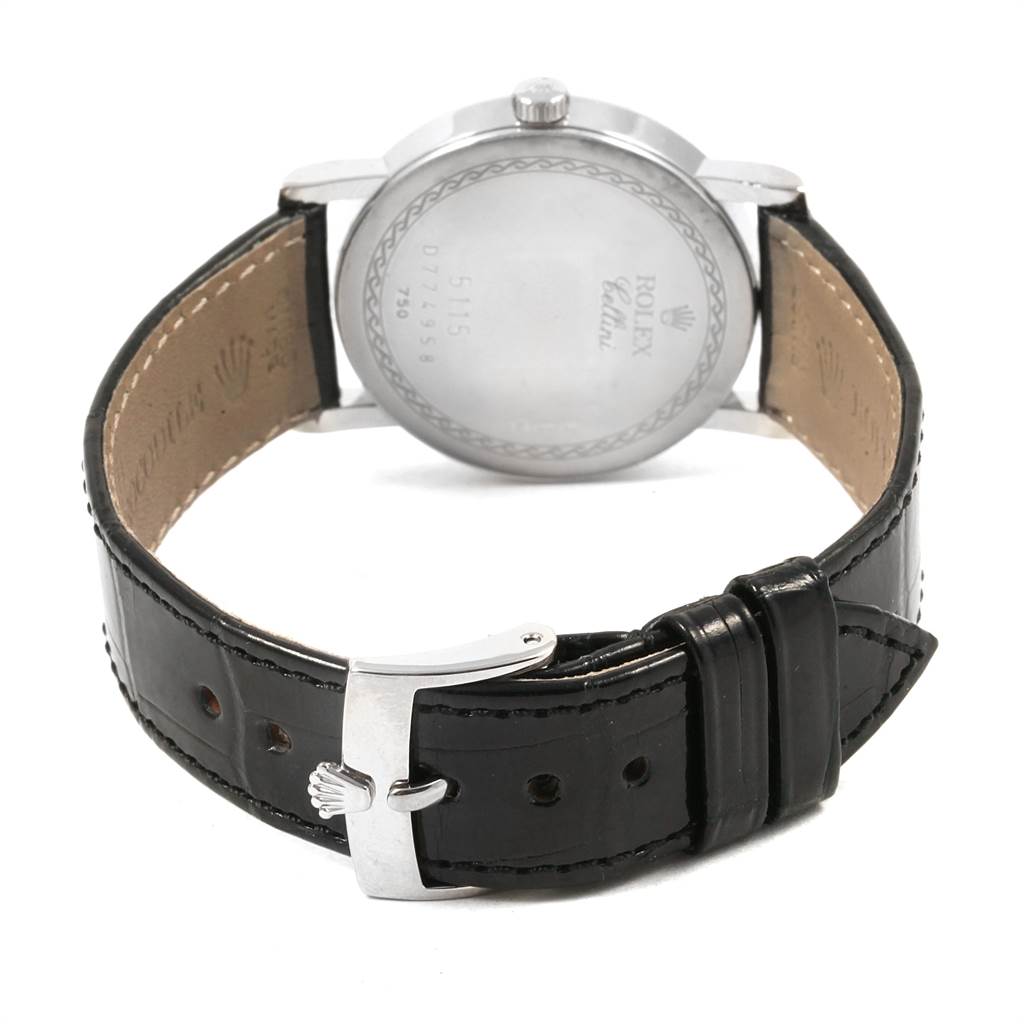 This image shows the back and strap of a Rolex Cellini 5115 Men's White Gold Black Dial 5115 Men's White Gold Black Dial watch, capturing the brand’s logo and model details.
