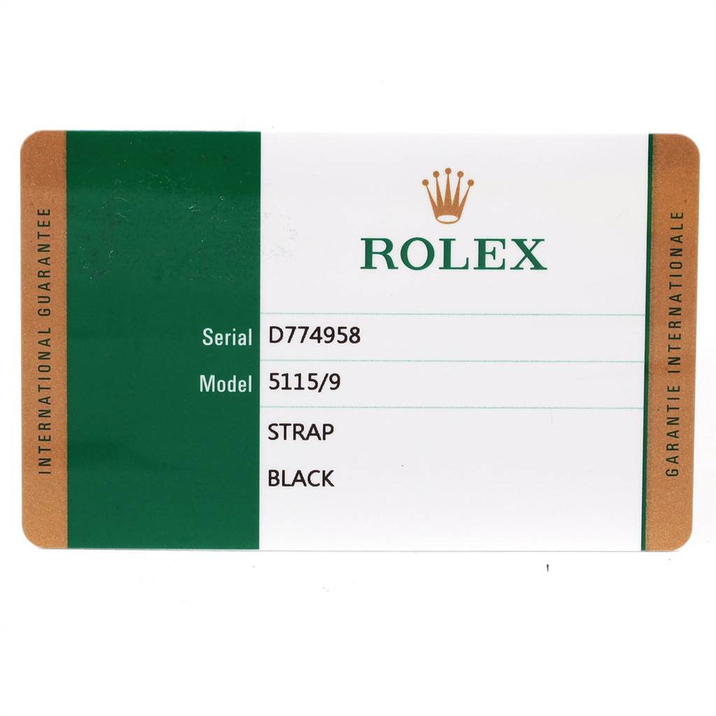 The image shows a Rolex Cellini 5115 Men's White Gold Black Dial 5115 Men's White Gold Black Dial model 5115/9 guarantee card specifying a black strap with serial number D774958.
