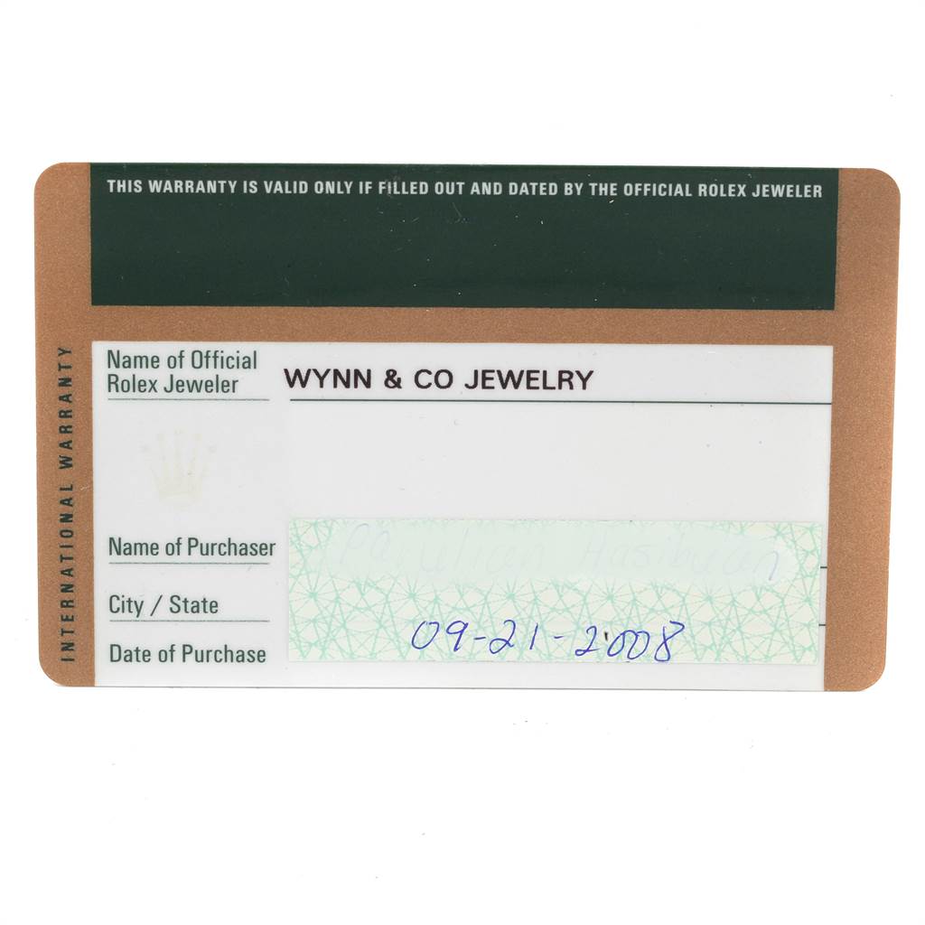 This image shows an international warranty card for a Rolex Cellini 5116 Men's White Gold Black Dial 5116 Men's White Gold Black Dial watch, including fields for the jeweler, purchaser, and purchase date.