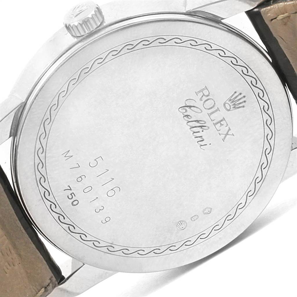 The image shows the case back of a Rolex Cellini 5116 Men's White Gold Black Dial 5116 Men's White Gold Black Dial model, highlighting its engravings and a portion of the strap.