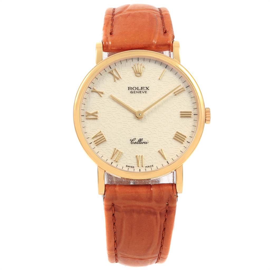 The image shows a front-facing view of a Rolex Cellini 5112 Men
s Yellow Gold Beige Dial 5112 Men
s Yellow Gold Beige Dial watch with a beige dial and a brown leather strap.