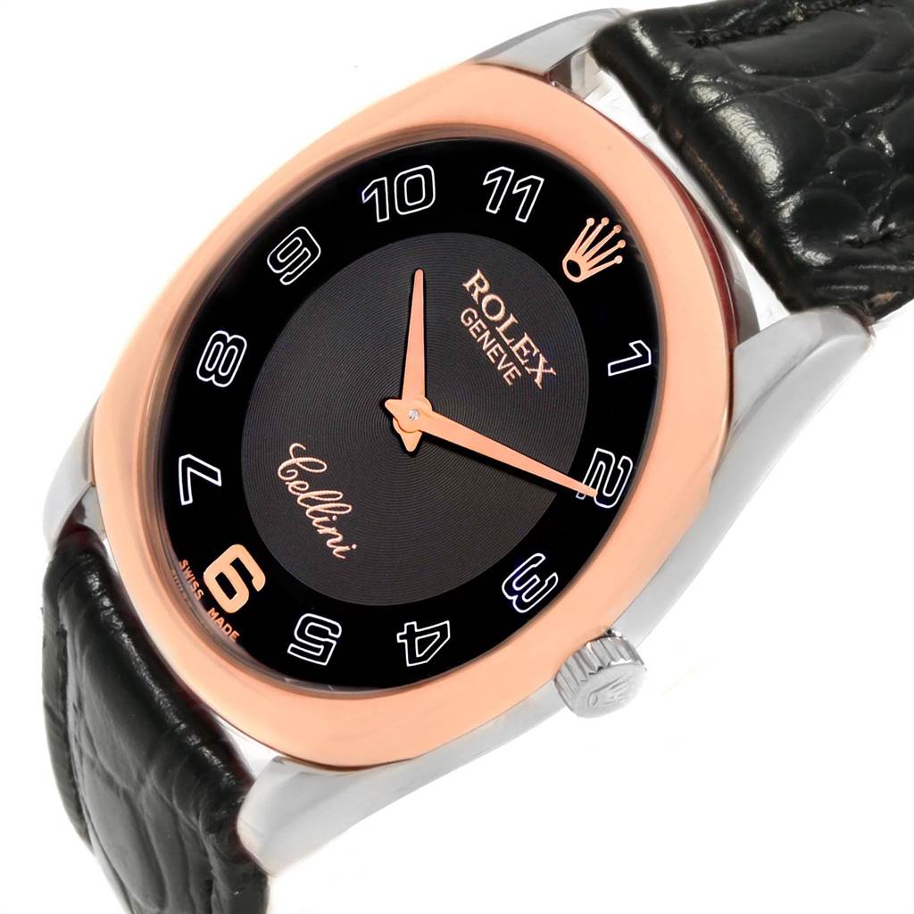 The Rolex Cellini 4233 White Gold Black Dial 4233 White Gold Black Dial watch is shown at an angled close-up, highlighting its black dial, rose gold bezel, and leather strap.