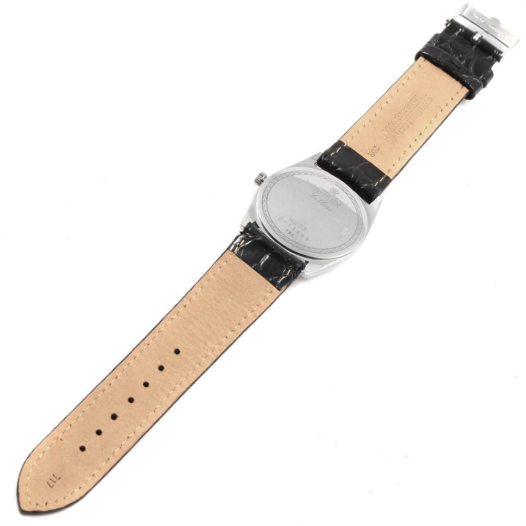 The image shows the back side of a Rolex Cellini 4233 White Gold Black Dial 4233 White Gold Black Dial watch, highlighting the case back, leather strap, and clasp.