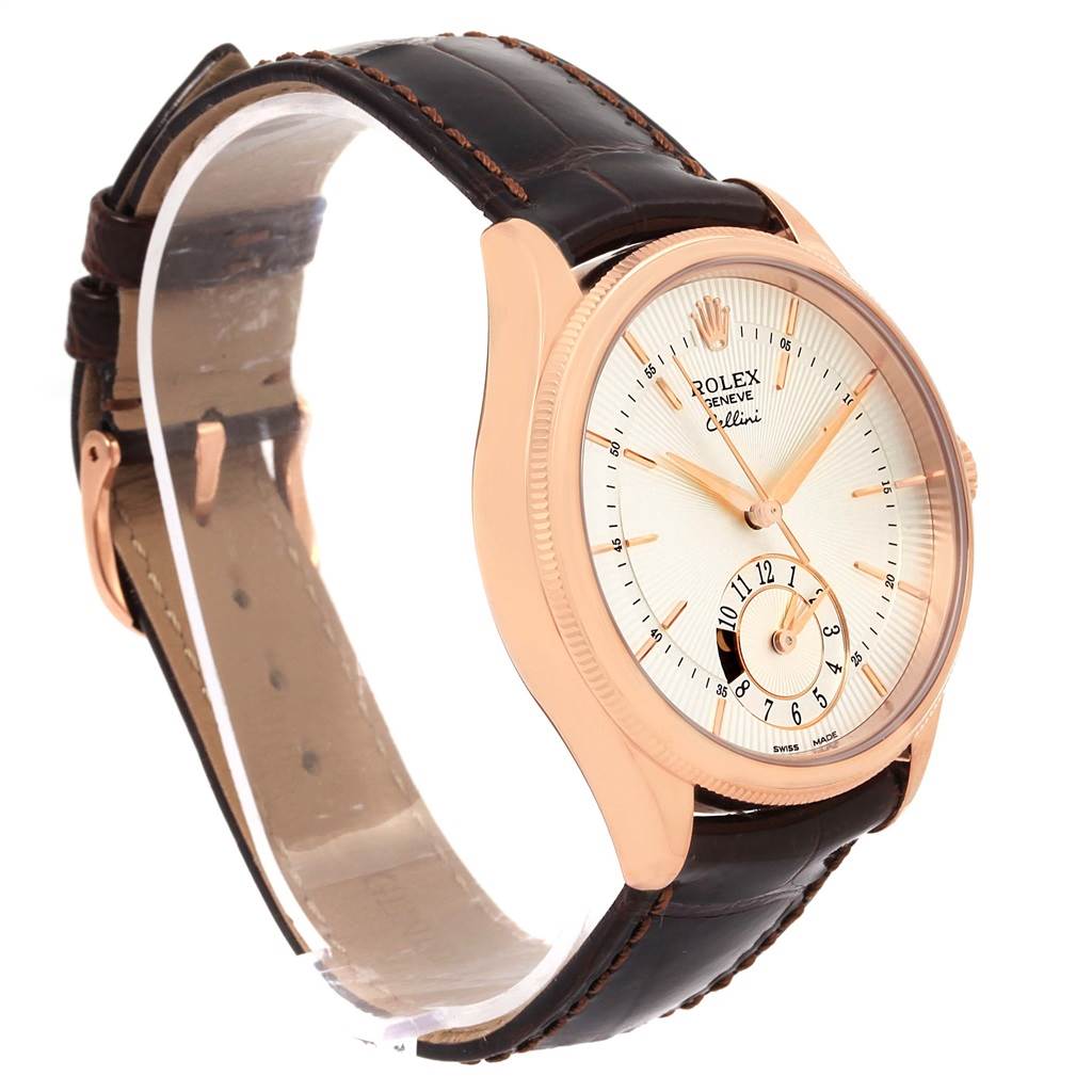 The image shows a Rolex Cellini 50525 Men
s Rose Gold Silver Dial 50525 Men
s Rose Gold Silver Dial watch at a three-quarter angle, highlighting its face, leather strap, and rose gold case.