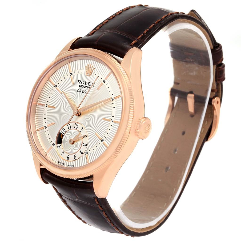 The image shows a Rolex Cellini 50525 Men
s Rose Gold Silver Dial 50525 Men
s Rose Gold Silver Dial watch at an angled view, featuring the dial, case, crown, and leather strap.