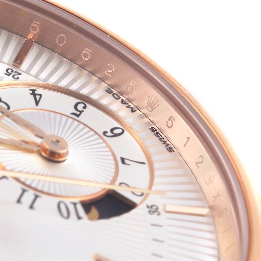 The image shows a close-up of the dial and bezel of a Rolex Cellini 50525 Men
s Rose Gold Silver Dial 50525 Men
s Rose Gold Silver Dial watch at an angle.